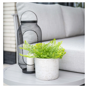 Rond bijzettafeltje Frigole loungeset met plant en lantaarn decoratie