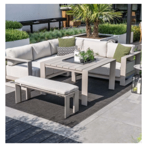 Levanto loungeset met eettafel en bank in strakke tuinopstelling